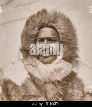 Matthew Alexander Henson, head-and-shoulders portrait, facing front, wearing fur hat and fur coat, circa 1910 Stock Photo