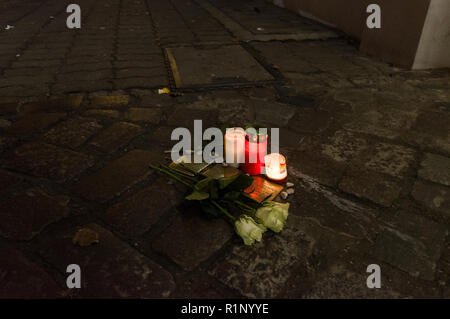 Berlin, Germany - 'Stolpersteine' (literally 'stumbling stones') with the names of Jewish victims under Nazism adorned with roses and candles Stock Photo