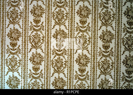 gold finished flock style old fashioned wallpaper Stock Photo