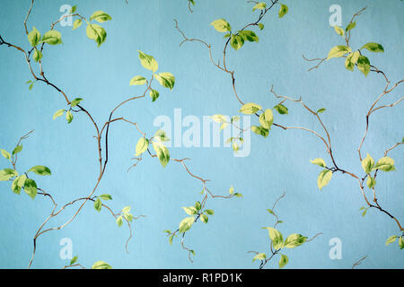 delicate leaves on wallpaper Stock Photo