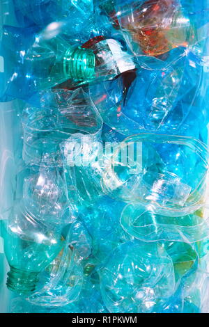 Empty colorful plastic bottles are recyclable waste Stock Photo