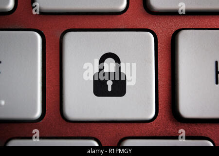 Image of padlock icon on computer keyboard button Stock Photo