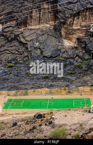 View of football pitch in  Wadi Bani Awf in Western Hajar Stock Photo