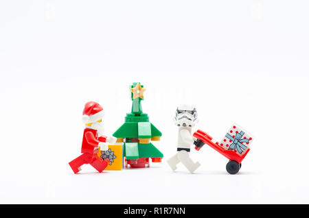 lego storm trooper steal gift from santa claus. Lego minifigures are manufactured by The Lego Group. Stock Photo