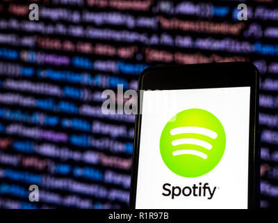 Spotify logo seen displayed on smart phone. Spotify Technology S.A. is a music streaming service developed by Swedish company Spotify Technology, which is head quartered in Stockholm, Sweden Stock Photo