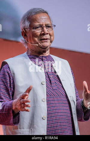 Muhammad Yunus, Nobel Peace Prize laureate, Yunus Center in Dhaka, Bangladesh is seen talking in the Barcelona Smart City Expo World Congress Keynotes and Inspirational Talks. Barcelona Smart City and Smart Mobility Expo World Congress. The event is based around the values of social inclusion and empowerment and is dedicated to promoting awareness, understanding and critical reflection between inhabitants of different cities worldwide, all in a climate of mutual respect and caring. Stock Photo