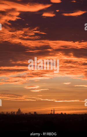City of London. 14th Nov 2018. UK Weather: Striking dawn clouds over the silhouette of the City of London Credit: amanda rose/Alamy Live News Stock Photo