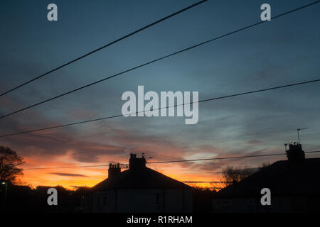 ST HELENS, UK. 14 November 2018. The clearing sky create a fiery sunset in St Helens, north-west England with colder weather predicted. Premos/Ģ����ý Live News Stock Photo