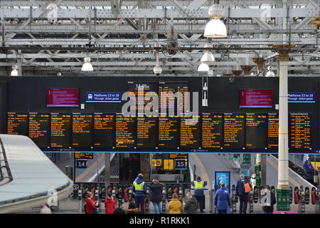 Edinburgh, UK. 14th Nov, 2018. Destination: Anyone's guess? Ahead of a Holyrood vote calling for the ScotRail break clause to be exercised, Scottish Labour leader Richard Leonard and Transport spokesperson Colin Smyth campaigned at Waverley station. Credit: Colin Fisher/Alamy Live News Stock Photo