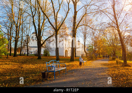 Veliky Novgorod, Russia -October 21, 2018. Autumn in Veliky Novgorod, Russia. Park alley at Yaroslav courtyard and ancient churches on the background  Stock Photo