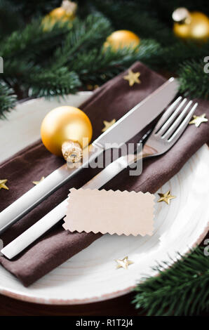Christmas table place setting in vintage or rustic style. Stock Photo