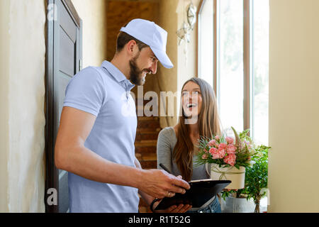 Man delivering flowers Stock Photo