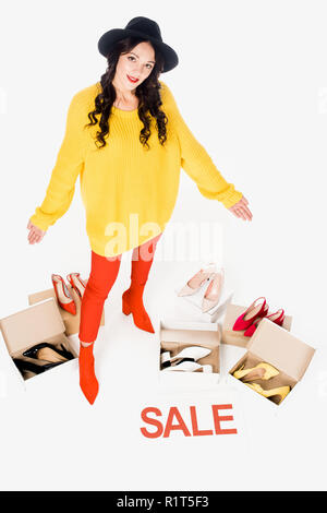 stylish shopaholic with sale symbol isolated on white with shoes Stock Photo