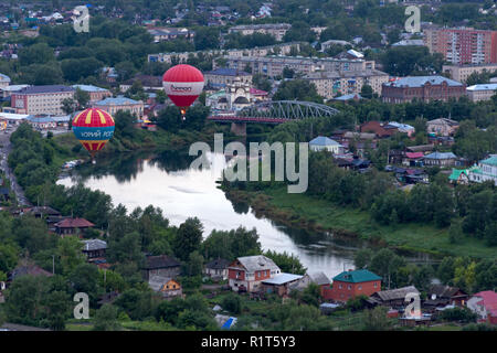 KUNGUR, URAL / RUSSIA – JULY 4 , 2009: Air view (from hot air balloon) to Sylva River bridge and two balloons, Kungur, Sky Fair of the Urals, Kungur. Stock Photo