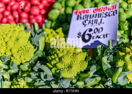 Close up view of a fresh romanesco cauliflower or broccoli heads for sale at Pike Place Market in Seattle, Washington Stock Photo