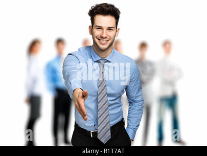 Young manager giving you a handshake Stock Photo