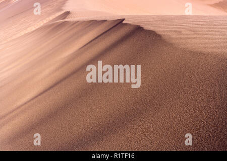 Sand dune at Valle de la Muerte (Spanish for Death Valley), Los Flamencos National Reserve, San Pedro de Atacama, Atacama desert, Antofagasta Region,  Stock Photo