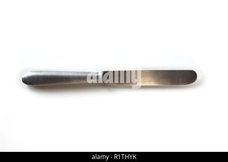 Old silver table knife isolated on a white background Stock Photo