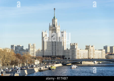 Moscow, Russia - November 13, 2018: View on Kotelnicheskaya Embankment Building, Moscow River, and cars in a traffic jam on Moskvoretskaya Embankment Stock Photo
