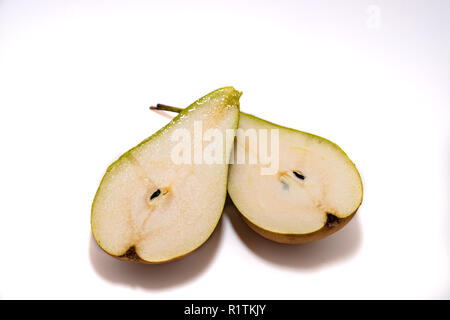Pear cut into two pieces on a white background 2018 Stock Photo