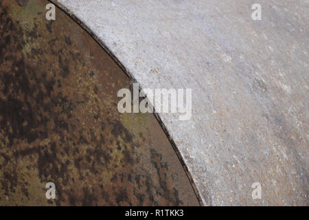 part of a metal farm roller, old and rusty metal farm roller made of heavy iron Stock Photo