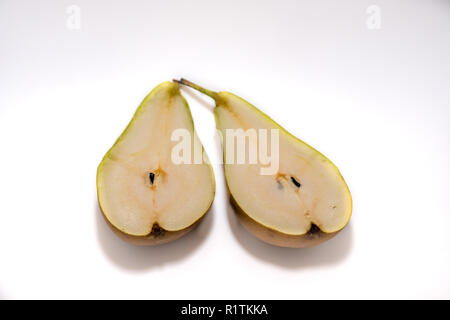 Pear cut into two pieces on a white background 2018 Stock Photo