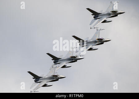 KLEINE BROGEL, BELGIUM - SEP 8, 2018: Formation of four Belgian Air Force F-16 fighter planes from 10 Wing over Kleine-Brogel Airbase. Stock Photo