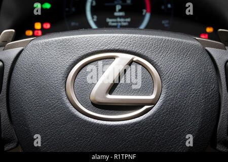 PARIS - OCT 3, 2018: Lexus logo on the steering wheel of a modern Lexus car at the Paris Motor Show. Stock Photo