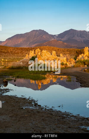 Calm waters at Mono Lake during sunrise in California Eastern Sierra Nevada mountains Stock Photo