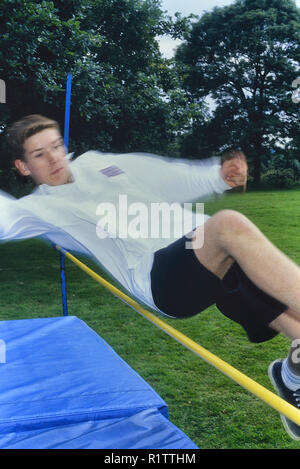 Teenage high jumper, England, UK Stock Photo