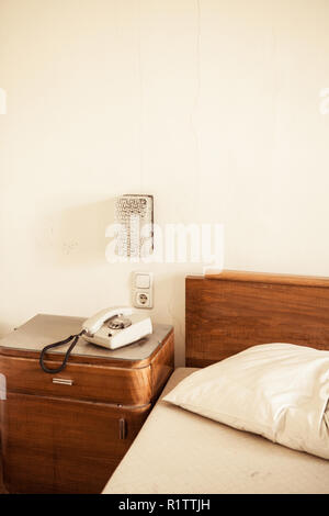 Bad Gastein, Austria - March 15, 2015: Wooden Furniture in hotel room at the abandoned Hotel Straubinger. Stock Photo