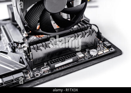 Installing random access memory into PC. Stock Photo