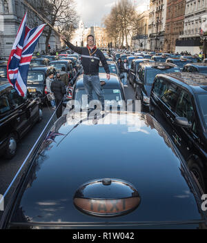 Whitehall, London, UK. 10th February, 2016. Thousands of taxi drivers protest in Whitehall and surrounding streets bringing traffic in central London  Stock Photo
