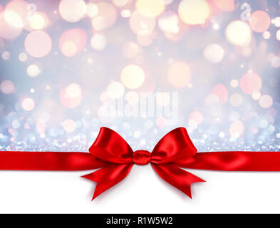 Red Ribbon With Bow On Shiny Silver Background - Christmas Gift Stock Photo