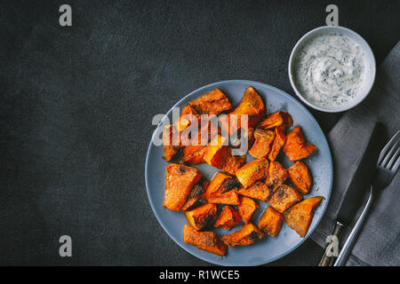 Top view of roasted pumpkin in rustic style Stock Photo