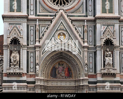 white & green marble statues and frescoes of frontage of The Duomo, Florence Cathedral (Cattedrale di Santa Maria del Fiore) in Florence,Tuscany,Italy Stock Photo