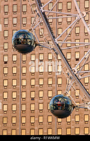 London Eye against Shell building, South Bank, London, England Stock Photo