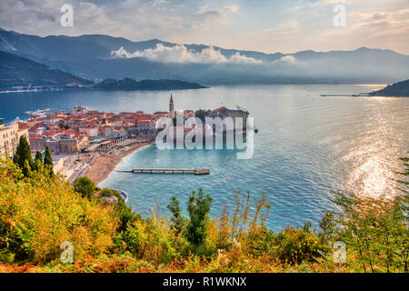 BUDVA, MONTENEGRO - OCTOBER 20: (EDITORS NOTE: Image is a digital [High Dynamic Range, HDR] composite.) The old town of Budva, the Obala (l) and Kupacica beaches are seen on October 20, 2018 in Budva, Montenegro. Budva is one of the oldest towns at the coast of the Adriatic Sea. Stock Photo