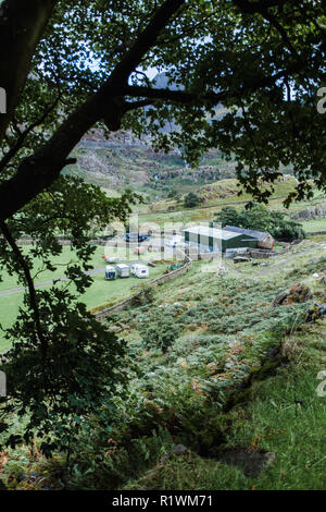 Farm homestead, nestled in the valley of Lake Ogwen, Llyn Ogwen, North Wales, UK, Snowdonia National Park Stock Photo