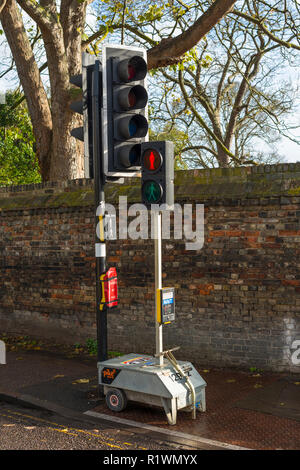 Portable, temporary traffic lights on a street in Cambridge, England, UK Stock Photo