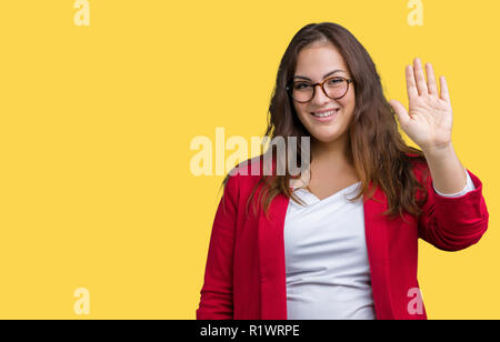 https://l450v.alamy.com/450v/r1wrpe/beautiful-plus-size-young-business-woman-wearing-elegant-jacket-and-glasses-over-isolated-background-waiving-saying-hello-happy-and-smiling-friendly-r1wrpe.jpg