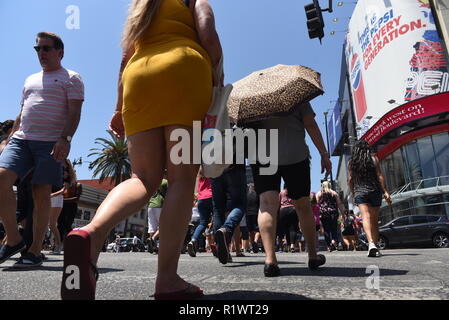 HOLLYWOOD - August 7, 2018: People crossing the road from low angle point of view on Hollywood blvd in Hollywood, CA. Stock Photo