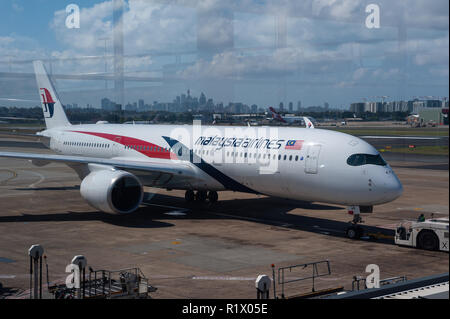 23.09.2018, Sydney, New South Wales, Australia - A Malaysia Airlines Airbus A350 passenger plane is seen during pushback at Sydney Airport.