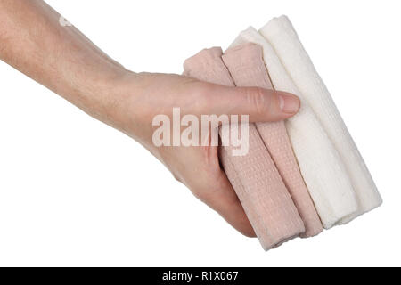 Elderly man holds in his hand a rag towels  to remove dust. Isolated on white studio macro shot Stock Photo