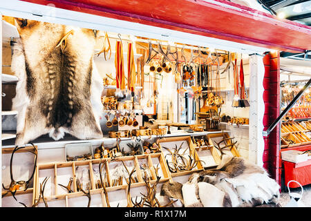 Winter Saami Souvenirs such as reindeer fur and horns at Finland in Lapland in winter. Stock Photo