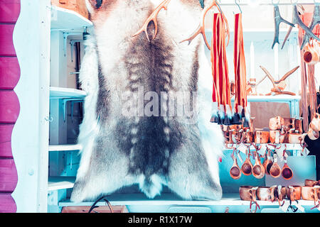 Winter Saami Souvenirs such as reindeer fur and horns in Reindeer in Finland in Lapland in winter. Stock Photo