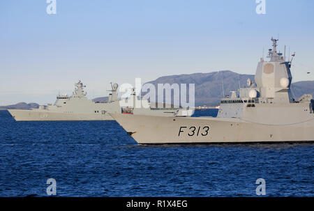 The ill fated KNM Helge Ingstad of the Royal Norwegian Navy in company with HDMS Esbern Snare a Absalon-class support ship of the Danish Navy Stock Photo