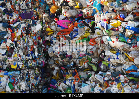 Pressed plastic waste cubes for recycling at the Mixed-waste processing facility stores in Russia. Stock Photo