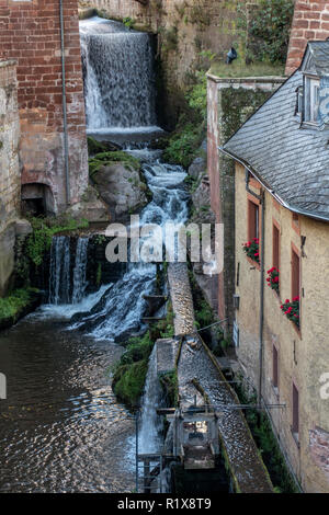 Old water mill and waterfall in Saarburg, Germany. Stock Photo