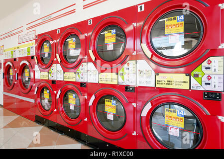 KGAWA, JAPAN - OCTOBER 29, 2018: Row of industrial washing machines in a public laundromat Stock Photo